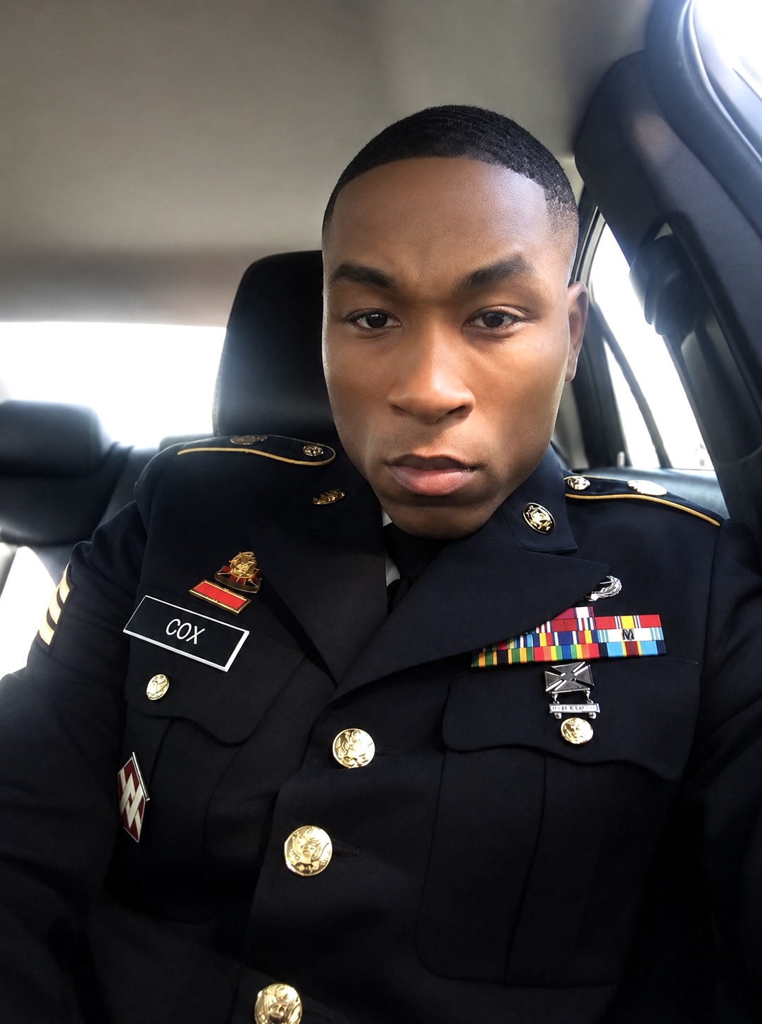 Jonathan A. Cox Jr. in U.S. Army dress uniform with service ribbons and decorations