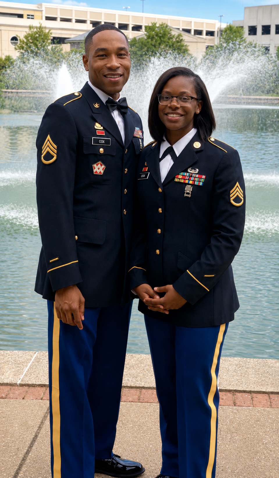 Jonathan A. Cox Jr. in U.S. Army dress uniform standing with a fellow soldier