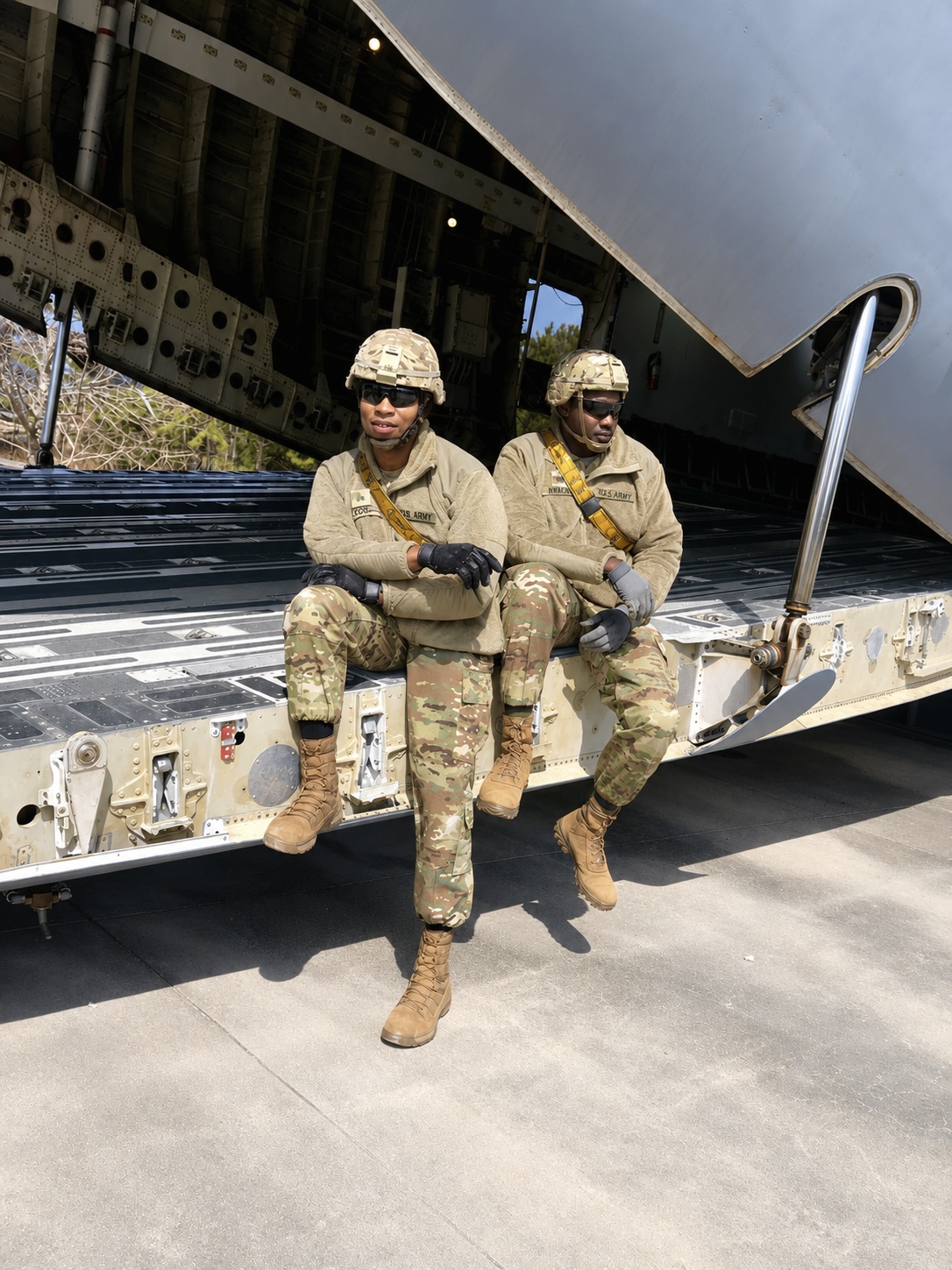 Jonathan A. Cox Jr. on the cargo ramp of a military airlifter during air freight operations